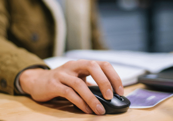 Hand clicking mouse